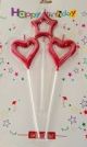 Candle with 2 hearts and a red star